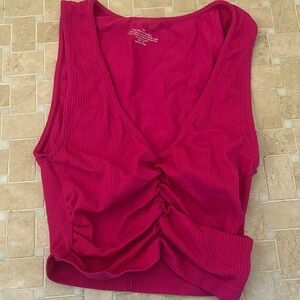 Bright pink twisted crop top